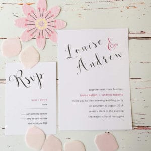 A trendy modern pink wedding invitation