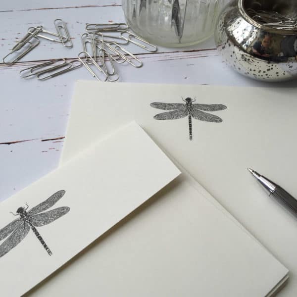 Writing paper with a Dragonfly illustration