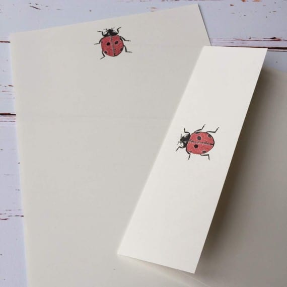 Writing paper with a Ladybird illustration