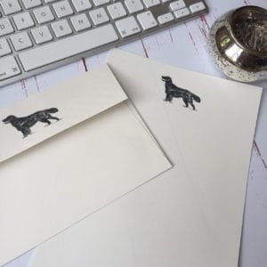 Writing paper with a Retriever illustration