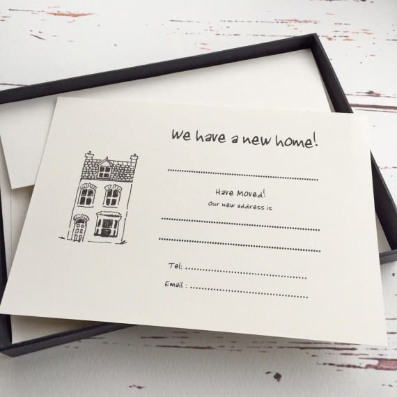 Blank change of address cards with a town house illustration